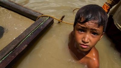 boy works at an underwater mining site