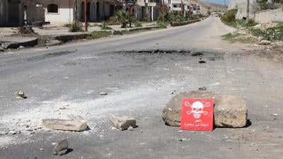 A poison hazard danger sign is seen in the town of Khan Sheikhoun, Idlib province, Syria on April 5, 2017. © 2017 Abdussamed Dagul/Anadolu Agency/Getty Images