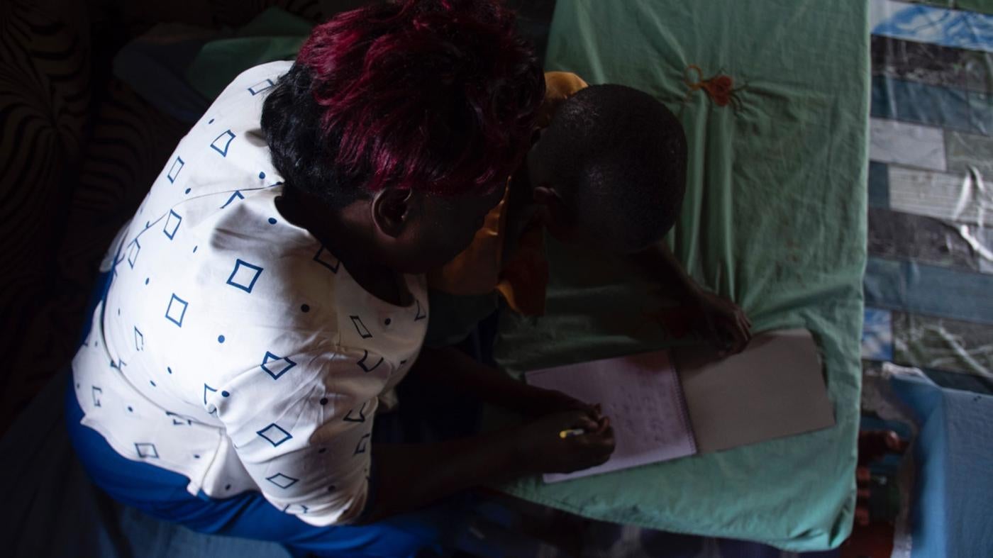 Gladys Koskey helps a nine-years-old rape survivor who lives in her home with her writing.