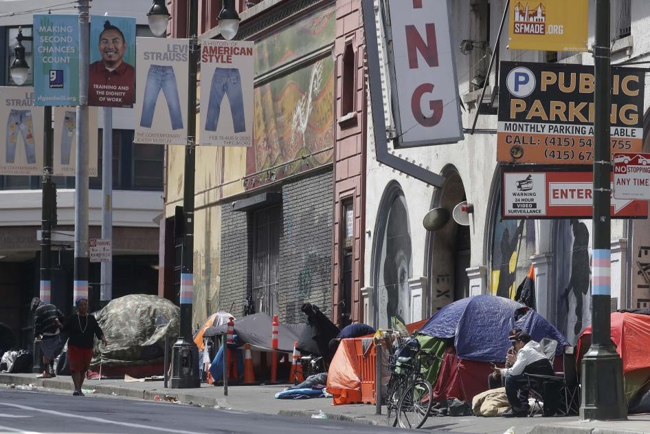 Tents line a sidewalk on Golden Gate Avenue in San Francisco, Saturday, April 18, 2020. 