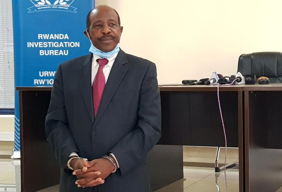 Paul Rusesabagina, who was detained on August 27, 2020, is paraded in front of the media in handcuffs at the headquarters of the Rwanda Investigation Bureau in Kigali, Rwanda on August 31.