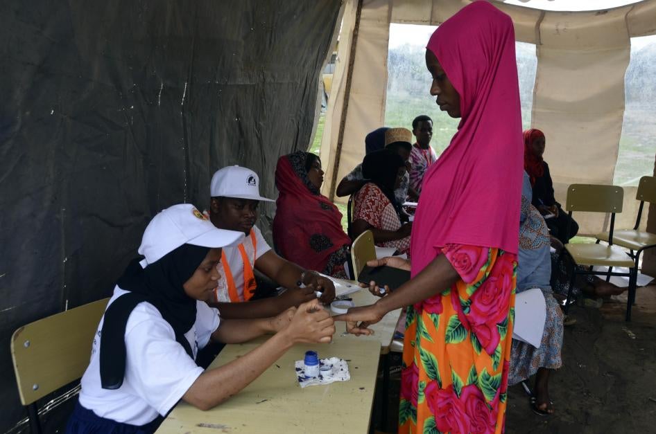 A woman inks her finger after voting in Zanzibar, Tanzania, October 28, 2020.