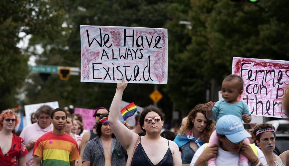 Transgender and non-binary individuals and their allies stroll through Atlanta’s Midtown district during Pride’s Transgender Rights March on Saturday, Oct. 12, 2019. 