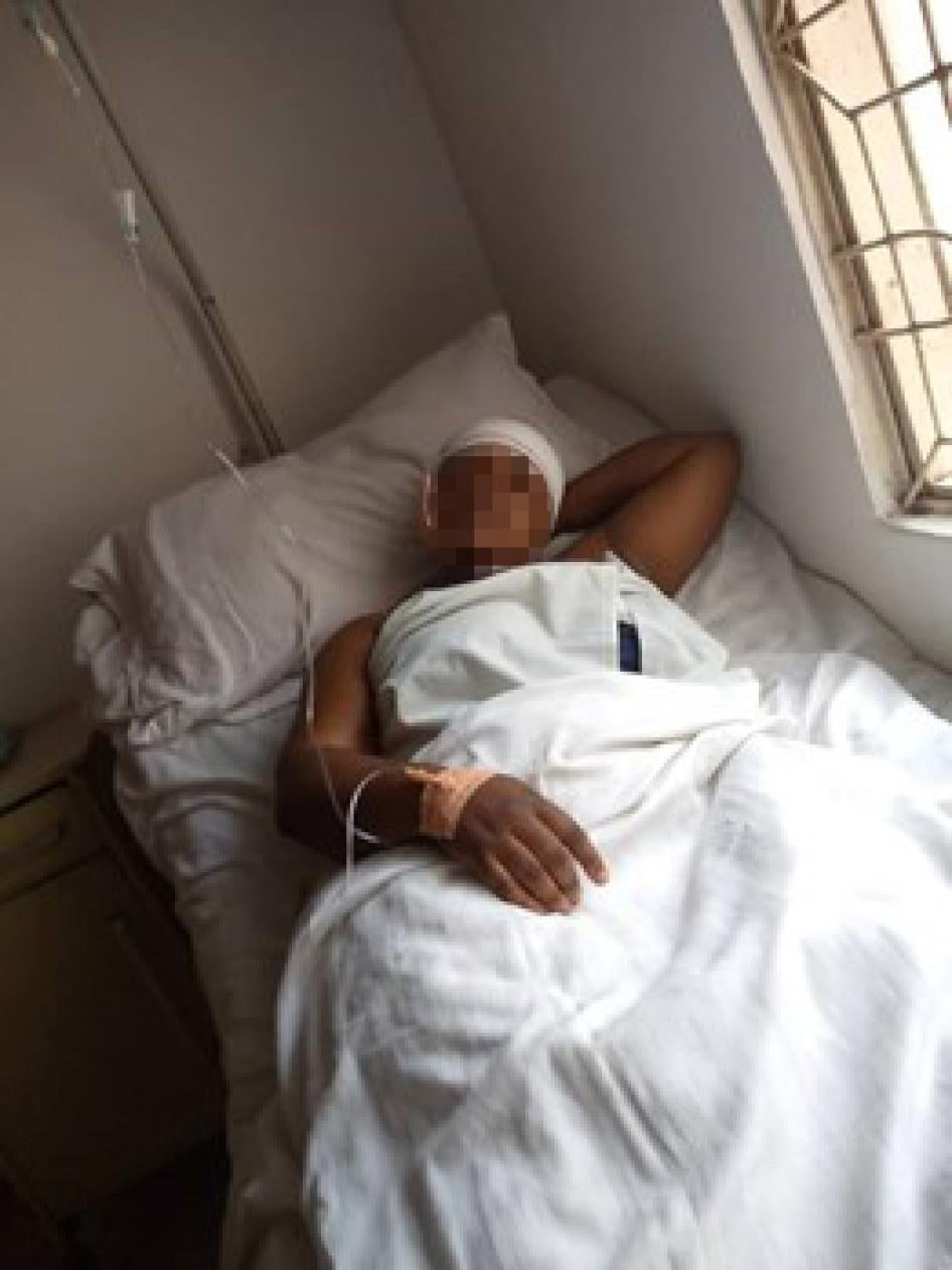 A woman lying on a hospital bed