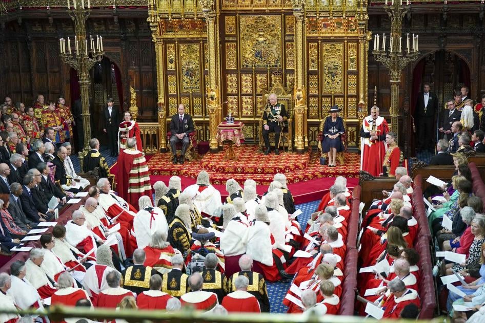 Prince Charles reads the Queen's speech next to her crown during the State Opening of Parliament, at the Palace of Westminster