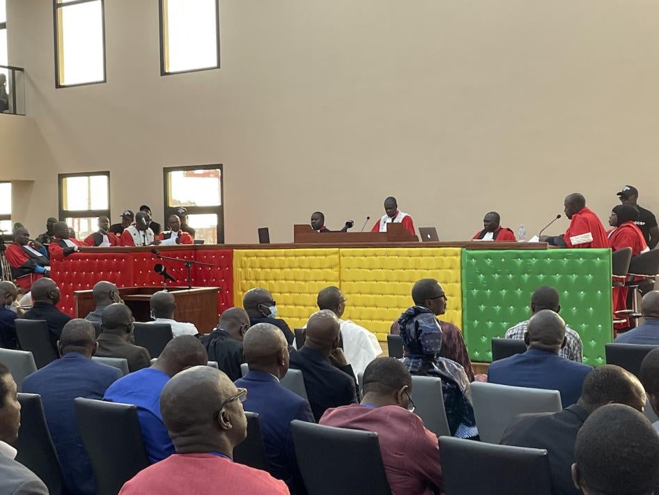 Defendants in Guinea’s 2009 stadium massacre trial appear before the judges on the first day of the trial, in Conakry, September 28, 2022. 