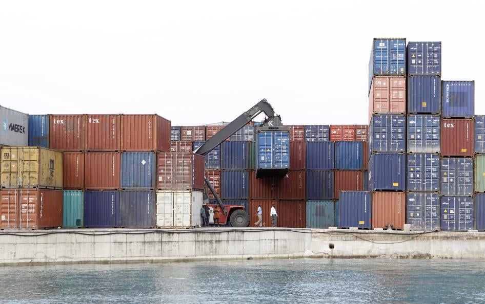A crane arranges containers at the Port of Zanzibar, Tanzania, July 19, 2012.