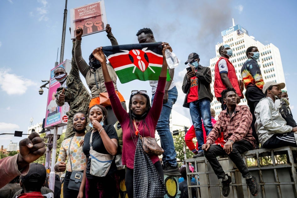 A protester holds a Kenyan flag during the nationwide demonstration against proposed legislation that would increase taxes across the country's economy, June 25, 2024. 