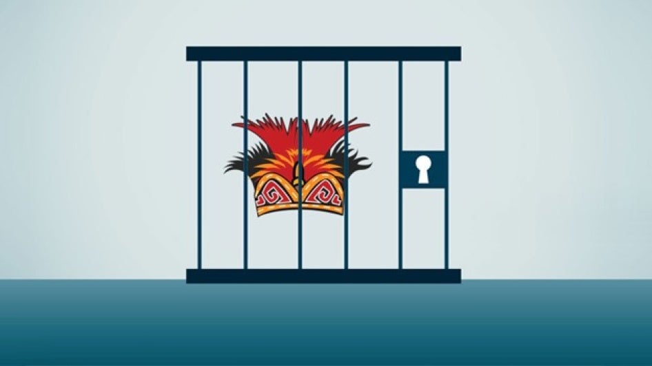 A graphic design of an indigenous Papuan headdress locked in a jail cell.