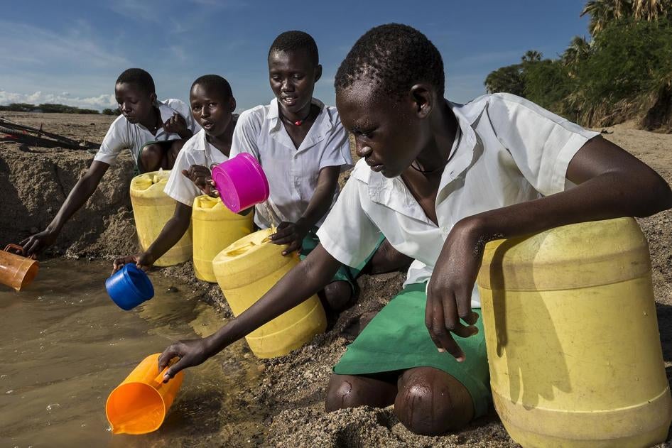 girls from the Kalokol Girls Primary School fetch water