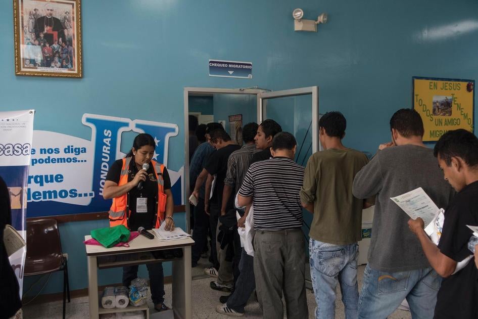 Returned migrants at the Attention Center for the Returned Migrant, San Pedro Sula airport, Honduras.