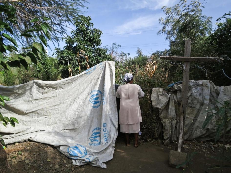 Maua E., 53, at her relocated home in Rift Valley. 