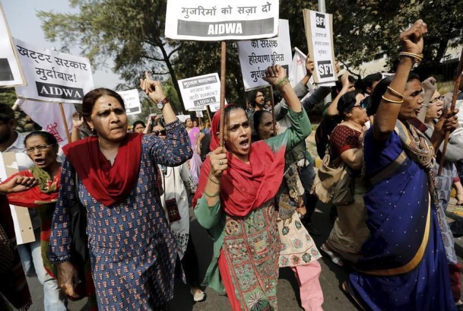 Activists from All India Democratic Women's Association (AIDWA) shout slogans as they carry placards outside the Haryana Bhawan during a protest in New Delhi, India, February 29, 2016 demanding a probe into what they said were rapes and sexual assaults in