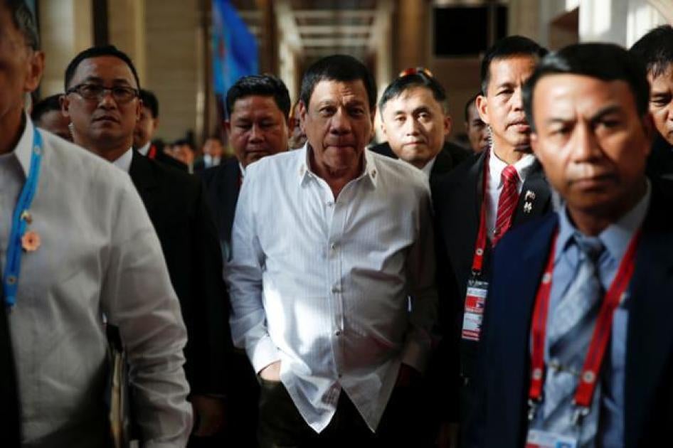 President Rodrigo Duterte walks between meetings at the ASEAN Summit in Vientiane, Laos on September 6, 2016. 