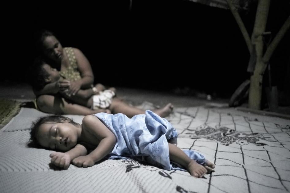  Sermary and her children in Kiribati. Sermary and her family, who move to New Zealand, are featured in the movie Anote’s Ark.