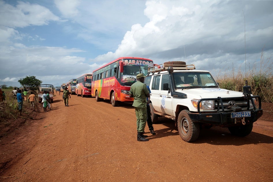 Buses carrying Burundian refugees arrive at the Nyabitare transit site in Ruyigi province, Burundi, on October 3, 2019, as part of a program to repatriate Burundians from Tanzania.