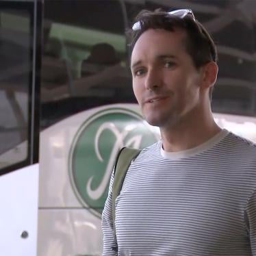 In this image made from a video, Australian Broadcasting Corp. journalist Bill Birtles speaks to the media on his arrival at Sydney airport, Australia, September 8, 2020.