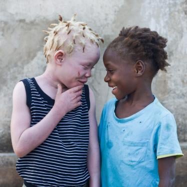Photograph of Josina (left) with her niece, Luisa. “She is my best friend,” said Josina. “She is always asking if I’m ok, she helps me read after school and she looks after me.”