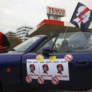 Protestors prepare to take part in a car demonstration organized by Women's Strike against imposing further restrictions on abortion law in Poland. 