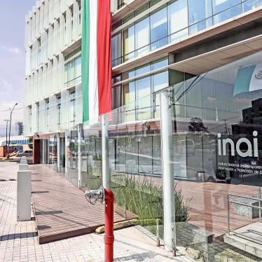A police officer walks outside the offices of the National Institute for Transparency and Access to Information and Data Protection (INAI) in Mexico City, Mexico.