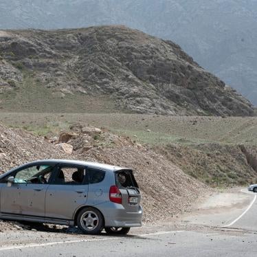 Cars damaged during a firefight on the Kyrgyz-Tajik border are seen near the settlement of Koi-Tash, Batken region, Kyrgyzstan, April 30, 2021.