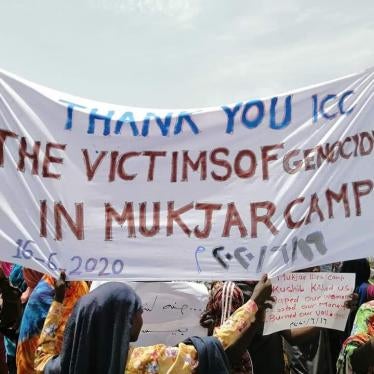 Displaced people in Ardamata camp in El Geneina, capital of West Darfur, welcoming the start of proceedings in the case against “Janjaweed” militia leader Ali Kosheib at the International Criminal Court. 