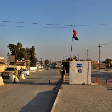 Iraqi soldiers stand guard at a checkpoint in Nineveh, Iraq. Friday Dec. 4, 2020.