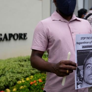 Activists attend a candlelight vigil against the impending execution of Nagaenthran K. Dharmalingam outside the Singaporean embassy in Kuala Lumpur, Malaysia