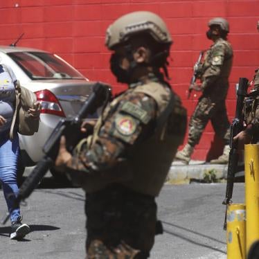 Soldiers guard a checkpoint at the entrance of the Las Palmas Community, in San Salvador, El Salvador, March 27, 2022.