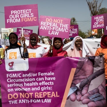 Protesters against female genital mutilation (FGM) demonstrate outside the National Assembly in Banjul, Gambia, on March 18, 2024. 