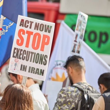 A demonstration on the anniversary of the death in custody of Mahsa Jina Amini with signs calling to stop the executions in Iran, September 14, 2024.