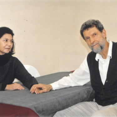 Osman Kavala and his wife Ayşe Buğra photographed during her visit to him in Silivri prison, Istanbul, January 2025.