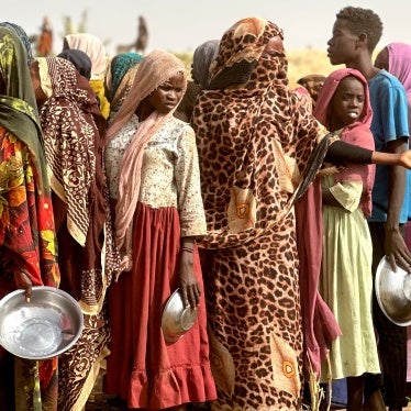 People in line for food rations in Sudan.