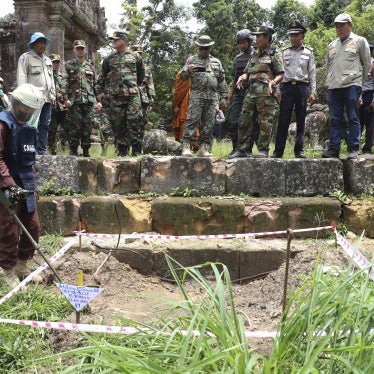 Cambodian military personnel and international observers inspect damage from shelling at Preah Vihear Temple in Preah Vihear province, Cambodia, August 20, 2025.