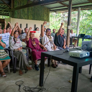 Members of Alianza Ceibo, belonging to the Siekopai, A’i Cofán, Siona, and Waorani Indigenous communities, attend a virtual hearing where a decision was made to unfreeze their organization’s funds. 
