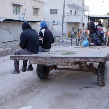 Palestinian laborers, including a 16-year-old, head out to work at a farm on an Israeli settlement in the West Bank.