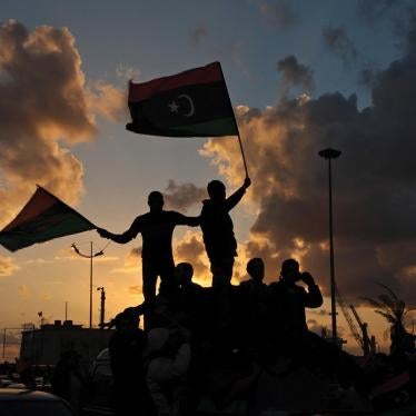 In Benghazi, Libya, on February 15, 2013 Libyans wave their national flags during a celebration to commemorate the second anniversary of the revolution that ousted Muammar Gaddafi. 