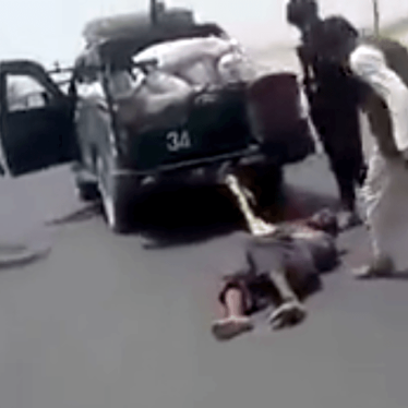 Screenshot of a video apparently showing Afghan police in Kandahar abusing a detainee.
