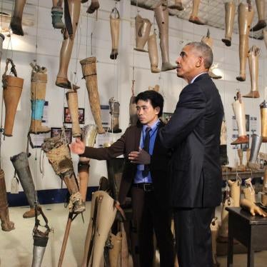 During President Obama's historic visit to Laos, he met with cluster bomb victims and toured the Cooperative Orthotic and Prosthetic Enterprise (COPE) visitors' centre in Vientiane with its operations manager Soksai Sengvongkham.