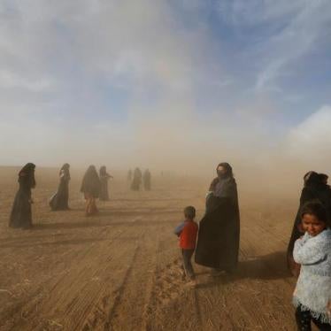 Civilians return to their village after it was retaken by anti-ISIS forces, south of Mosul, Iraq, October 21, 2016. 