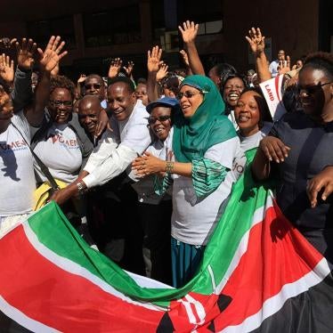 Kenya's Lands Minister and principal secretary in the Lands and Physical Planning Ministry welcome a group of women on October 13, 2016 who will climb Mount Kilimanjaro on October 14 as part of a campaign for land rights in Nairobi, Kenya.