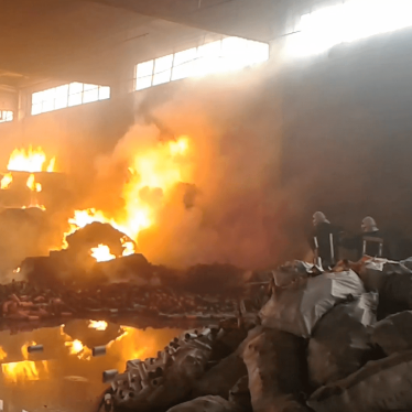 Fire on building takes caused by an incendiary weapon.