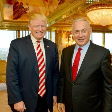 Israeli Prime Minister Benjamin Netanyahu (R) stands next to Republican U.S. presidential candidate Donald Trump during their meeting in New York, September 25, 2016. 