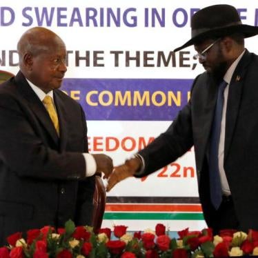 South Sudan's President Salva Kiir (R) and Ugandan President Yoweri Kaguta Museveni attend the opening of the National Dialogue committee in Juba, South Sudan May 22, 2017.