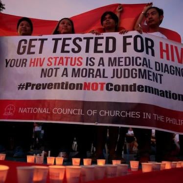 Campaign supporters hold a banner during a commemoration event on International AIDS Candlelight Memorial Day in Quezon City, Metro Manila, Philippines, May 14, 2016.
