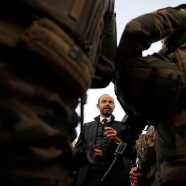 French Prime Minister Edouard Philippe meets soldiers during a visit at the Eiffel Tower in Paris, as France officially ended a state of emergency regime, replacing it with the introduction of a new security law, France, November 1, 2017. REUTERS/Christia