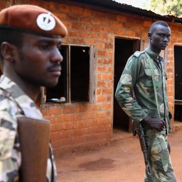 UPC fighters outside a kindergarten in Ngadja, Ouaka province. The fighters have used the building as a base since October 2014. 