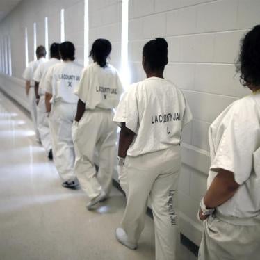 Women walk along a corridor at the Los Angeles County women's jail.