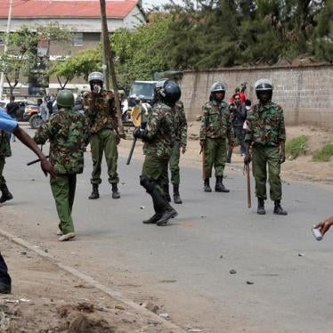 Policemen attempt to disperse supporters of Kenyan opposition leader Raila Odinga of the National Super Alliance (NASA) coalition along Likoni road as they are repulsed from accessing city Centre, in Nairobi, Kenya November 17, 2017. 