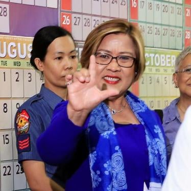 Philippine Senator Leila de Lima, who is detained on drug charges, gestures a "Laban" (Fight) sign inside a local court where she faces an obstruction of justice complaint in Quezon city, metro Manila, Philippines March 13, 2017.
